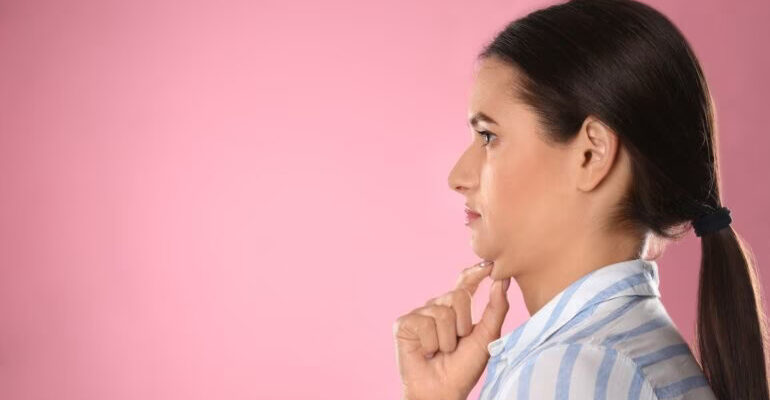 Facial exercises to target and reduce double chin appearance.