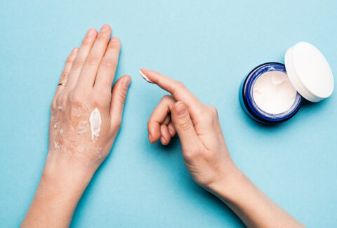 Home remedies for itchy skin rashes - A woman applying natural treatment on irritated skin