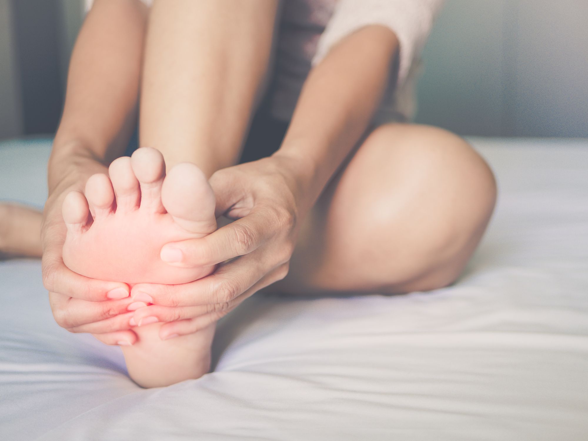  Illustration of Leg and Foot Cramps at Night - A person experiencing nocturnal leg cramps. 