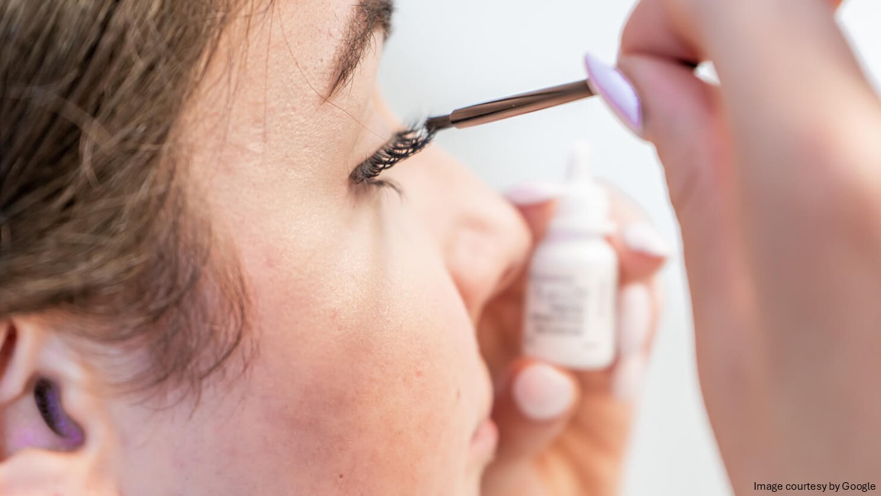 Person using careprost eye drop