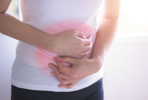 Person Experiencing Constipation Discomfort