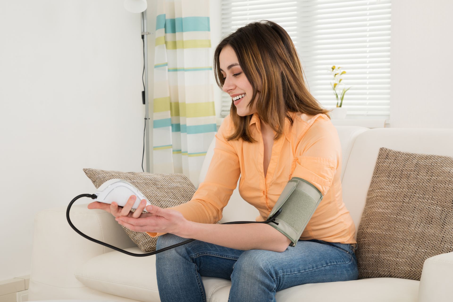 Person Monitoring Blood Pressure - All Day Chemist