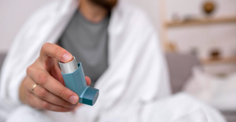 Image of various inhaled asthma medications, including metered dose inhalers (MDIs)