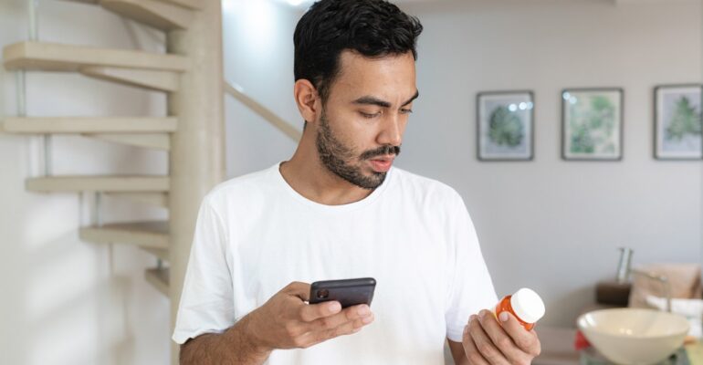 Person Holding Tablet of Tadalafil 10 mg – Understanding Tadalafil Dosage