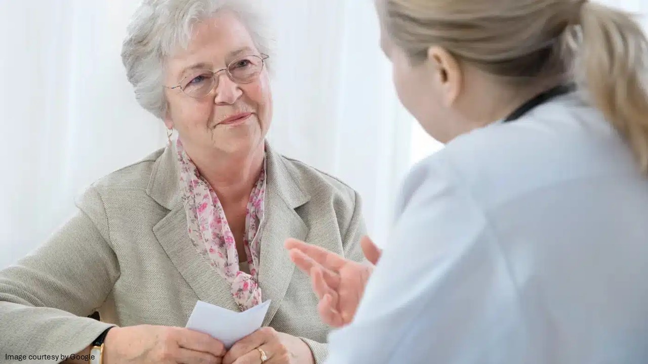 Doctor talking to a older lady