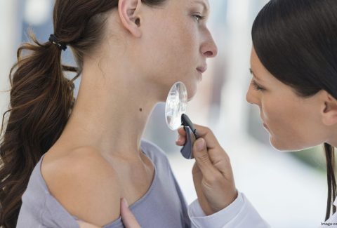 doctor consulting Melanoma patient