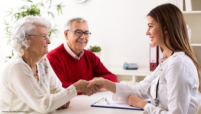 aged patient consulting to doctor